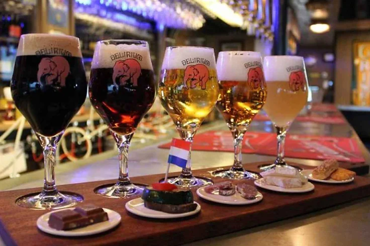 A flight of Delirium beers with pairings