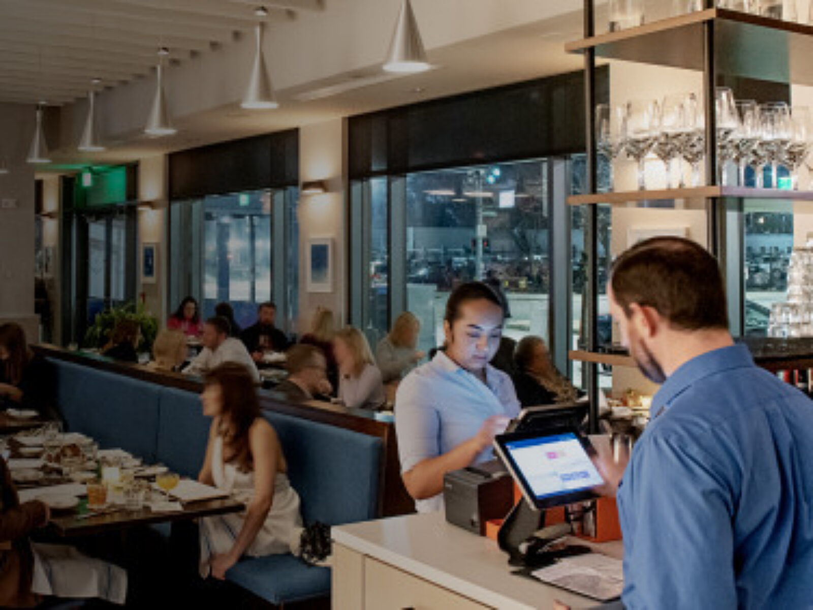 A busy restaurant dining area - How to Create a Restaurant Staff Schedule