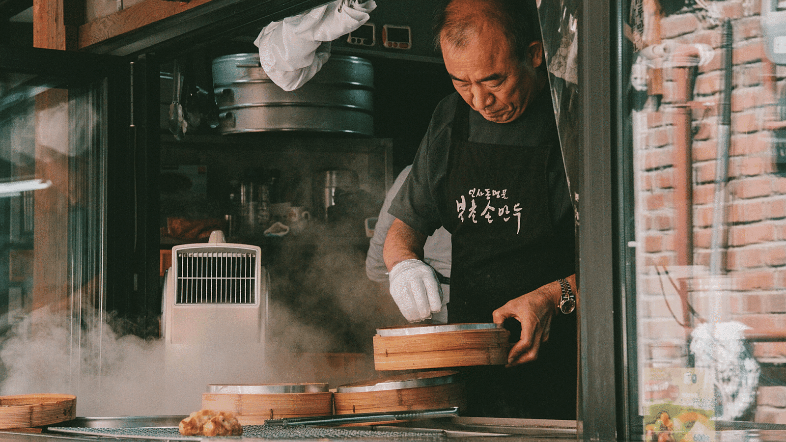 Man cooking dumplings chef