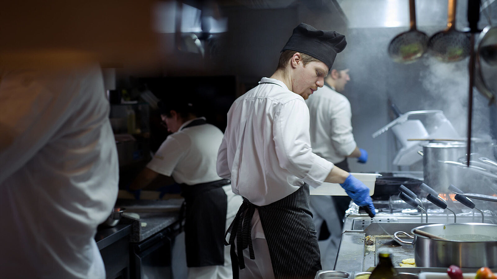 Line cook in the kitchen